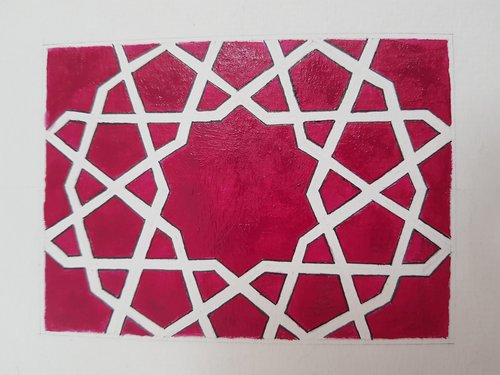 Another geometric design painted in red nail polish
