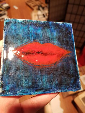 Red lips in a blue background